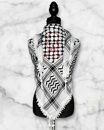 Embroidered keffiyehs with different colors and designs to choose from