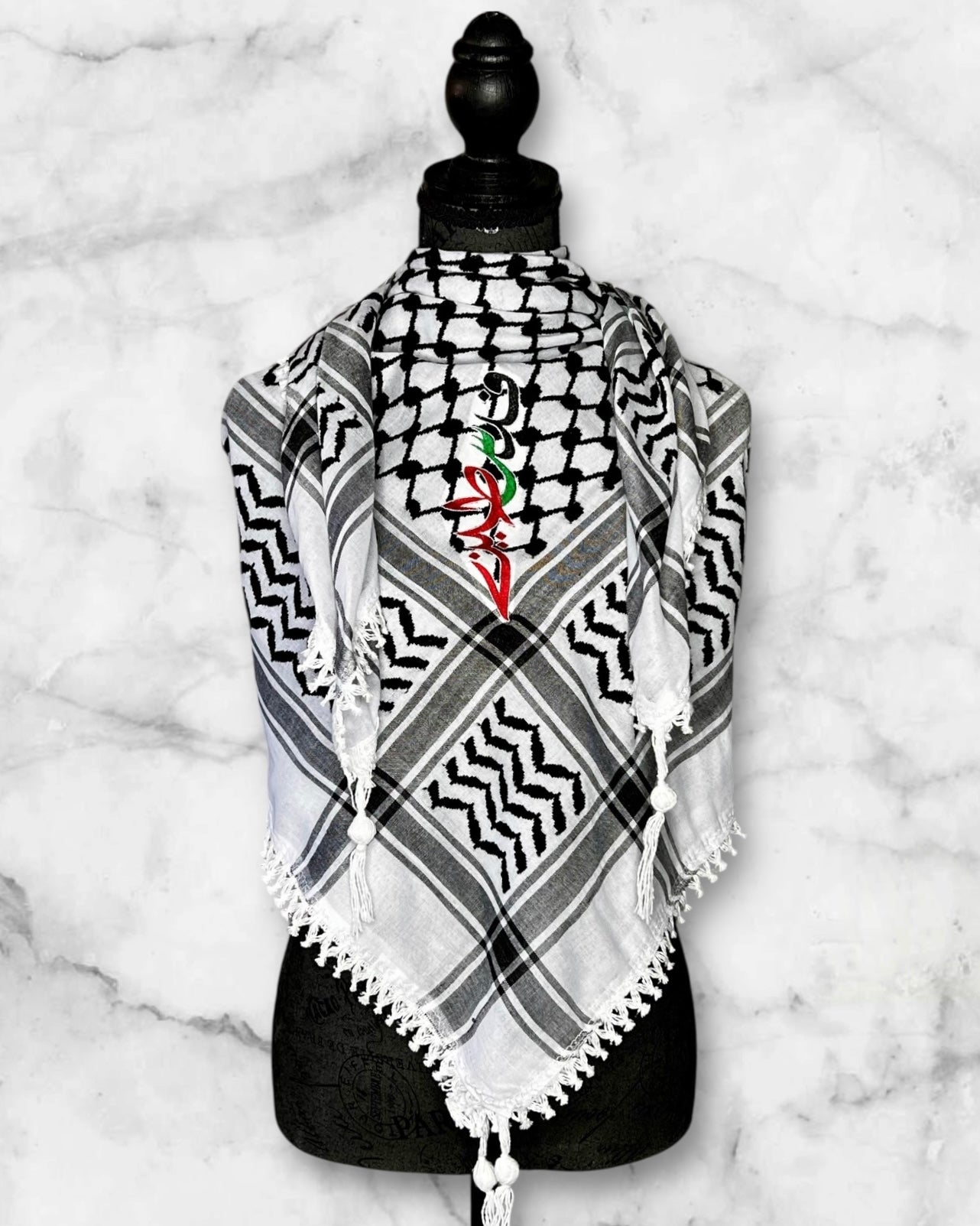 Embroidered keffiyehs with different colors and designs to choose from