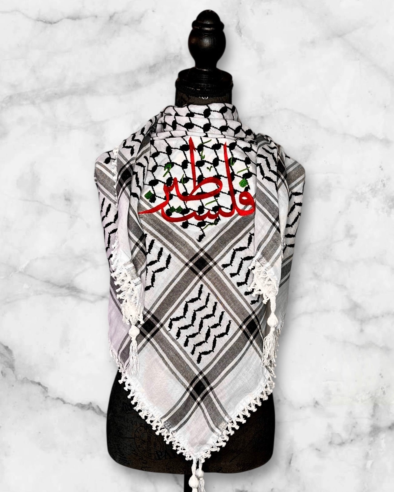 Embroidered keffiyehs with different colors and designs to choose from