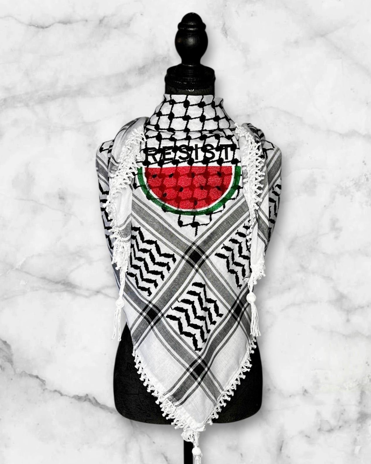 Embroidered keffiyehs with different colors and designs to choose from