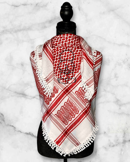 Embroidered keffiyehs with different colors and designs to choose from